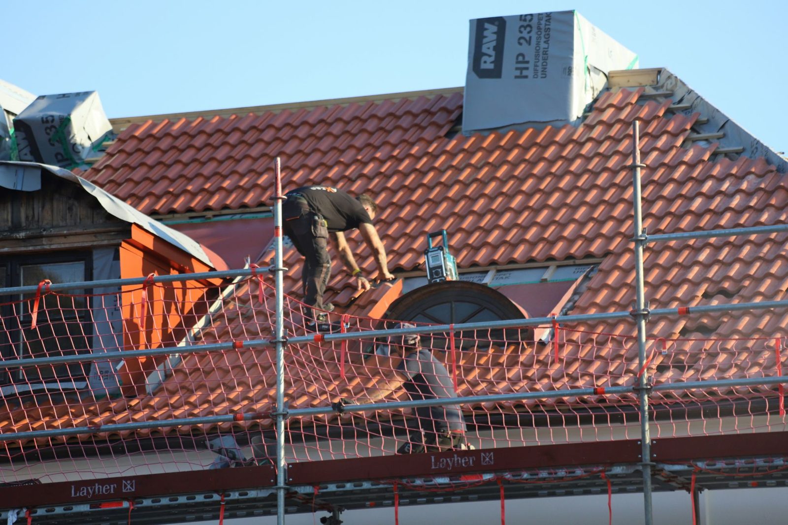 Professional roofer at work